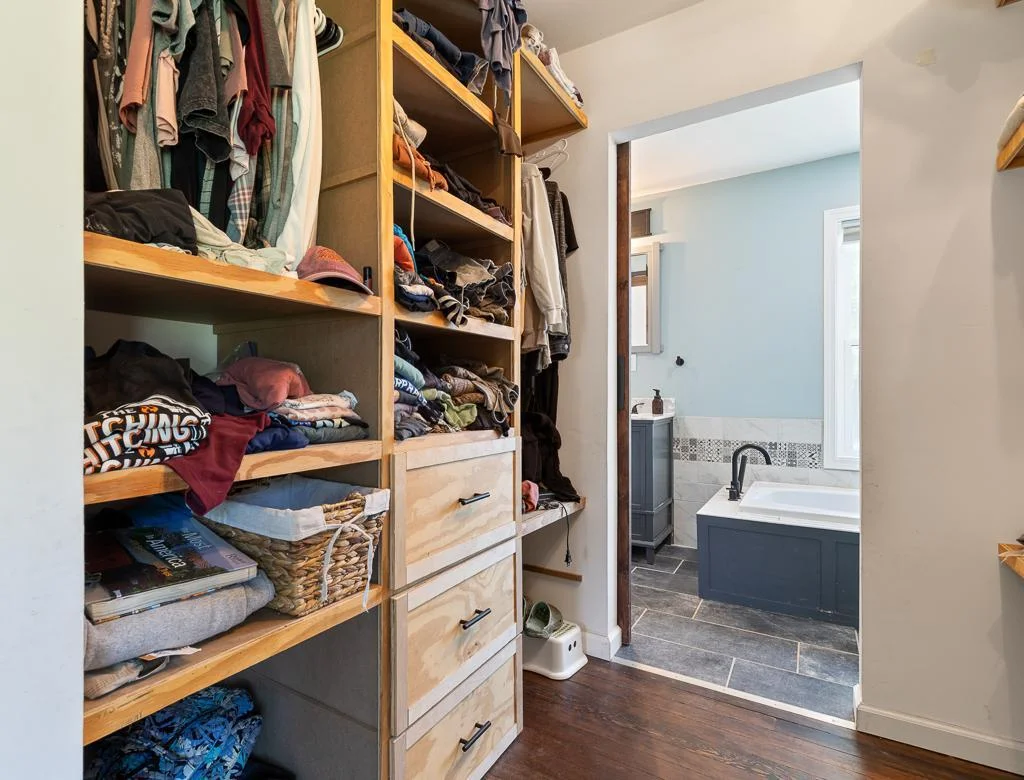 Custom built cabinetry to organize clothes, accessories, and more