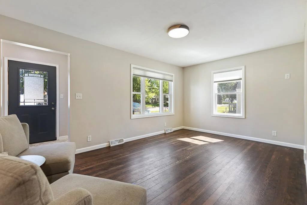 The front entry welcomes you in to a bright living room