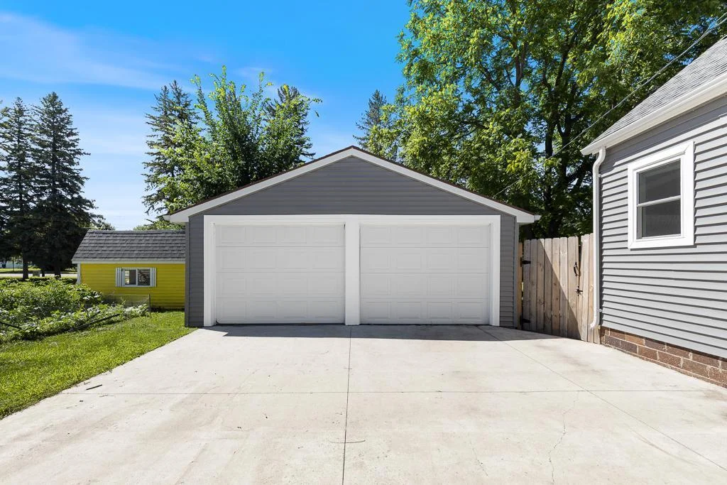 The 2-stall garage features new garage doors