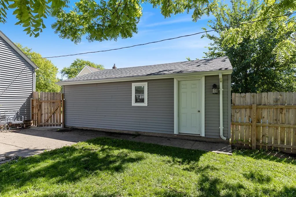 The detached garage features direct access to the backyard!