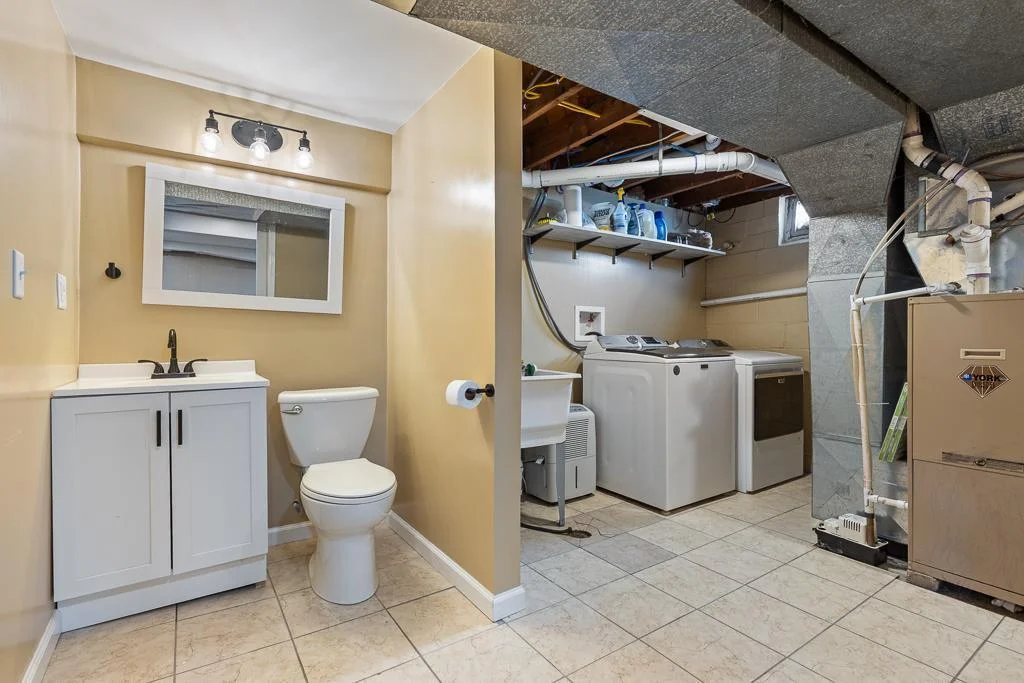 Lower level bathroom/laundry/utility area