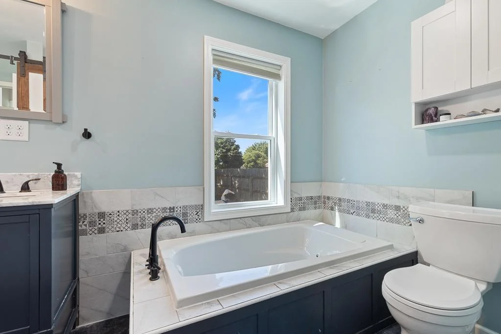 How about this relaxing soaking tub? You won't want to leave this bathroom!
