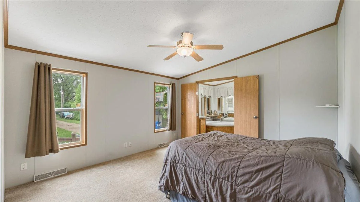 Master bedroom w/ lake views