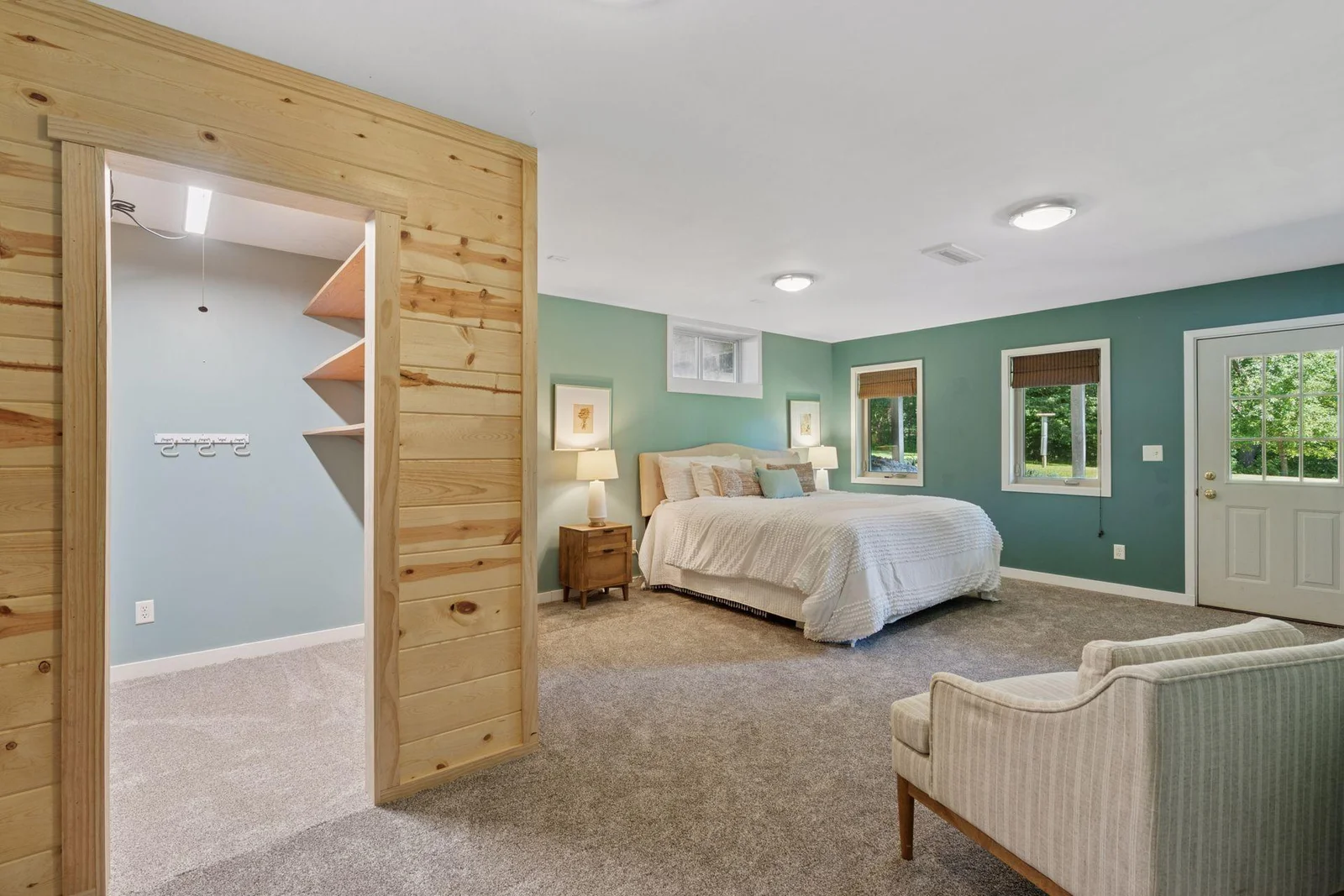 View of lower level bedroom and walk-in closet