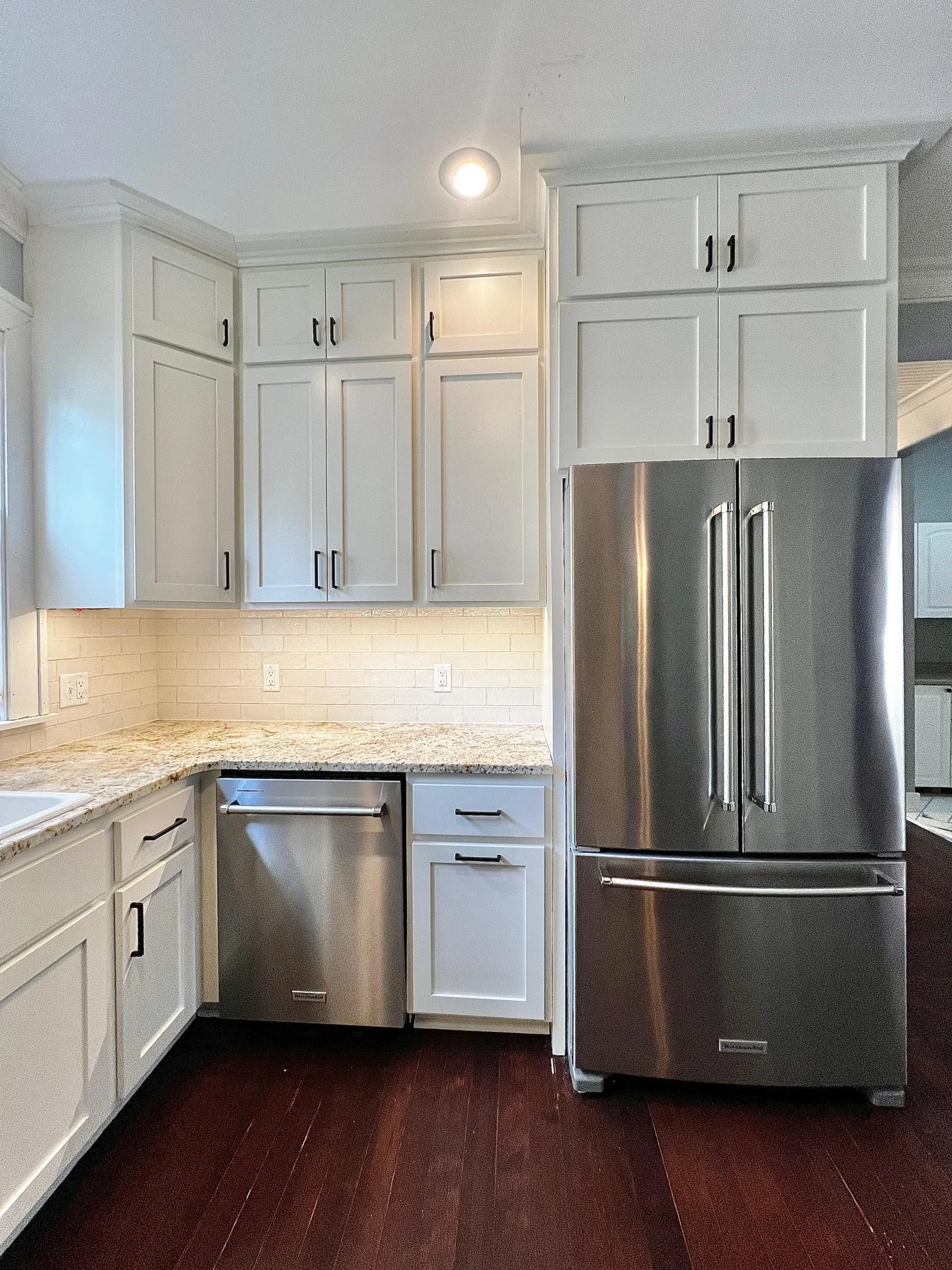 Custom Cabinets with Soft Close Feature, Kitchen Aid Pro Series Appliances, Ceramic Tile Backsplash, Granite Counter Tops.