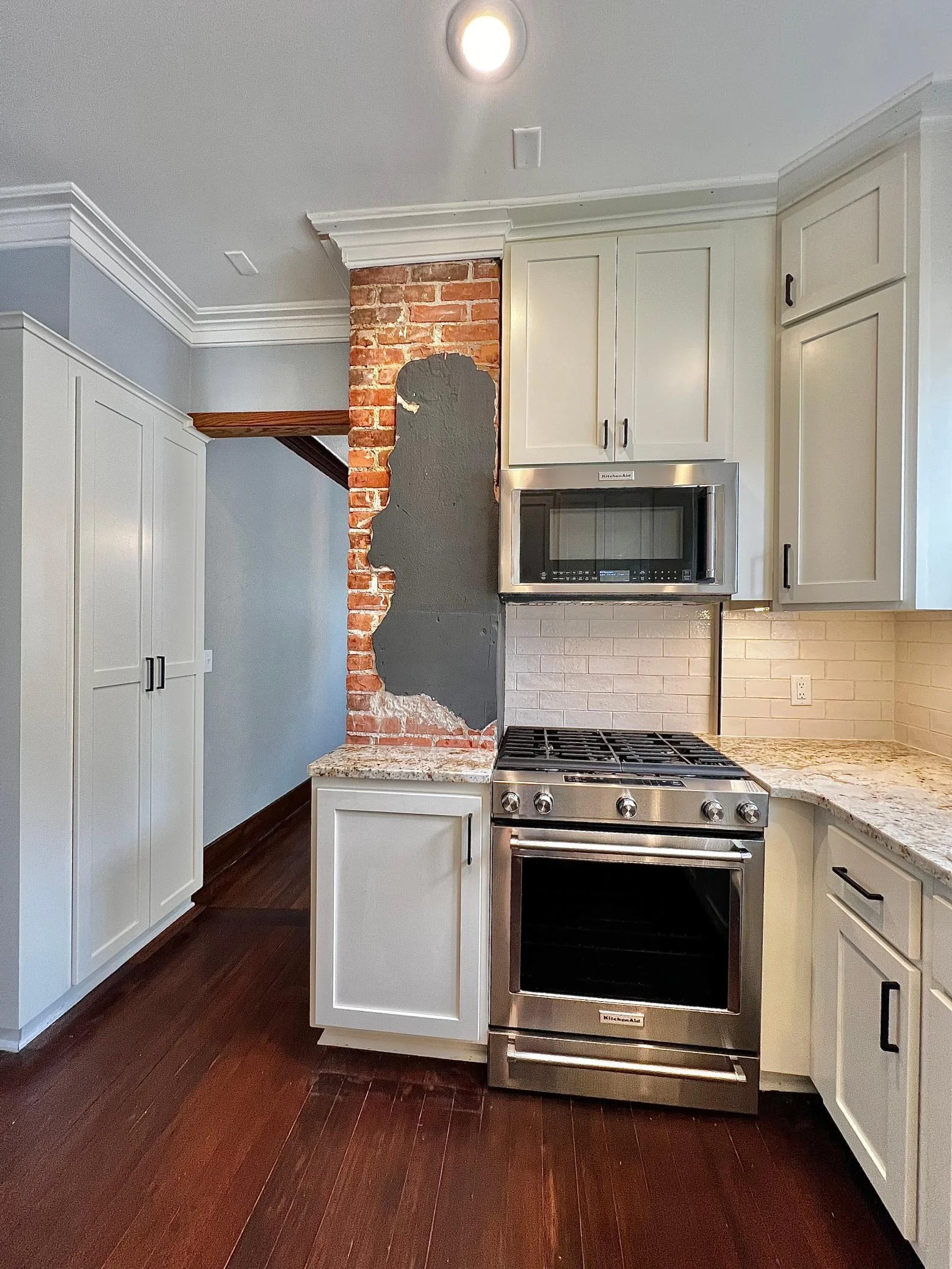 Custom Cabinets with Soft Close Feature, Kitchen Aid Pro Series Appliances, Ceramic Tile Backsplash, Granite Counter Tops.