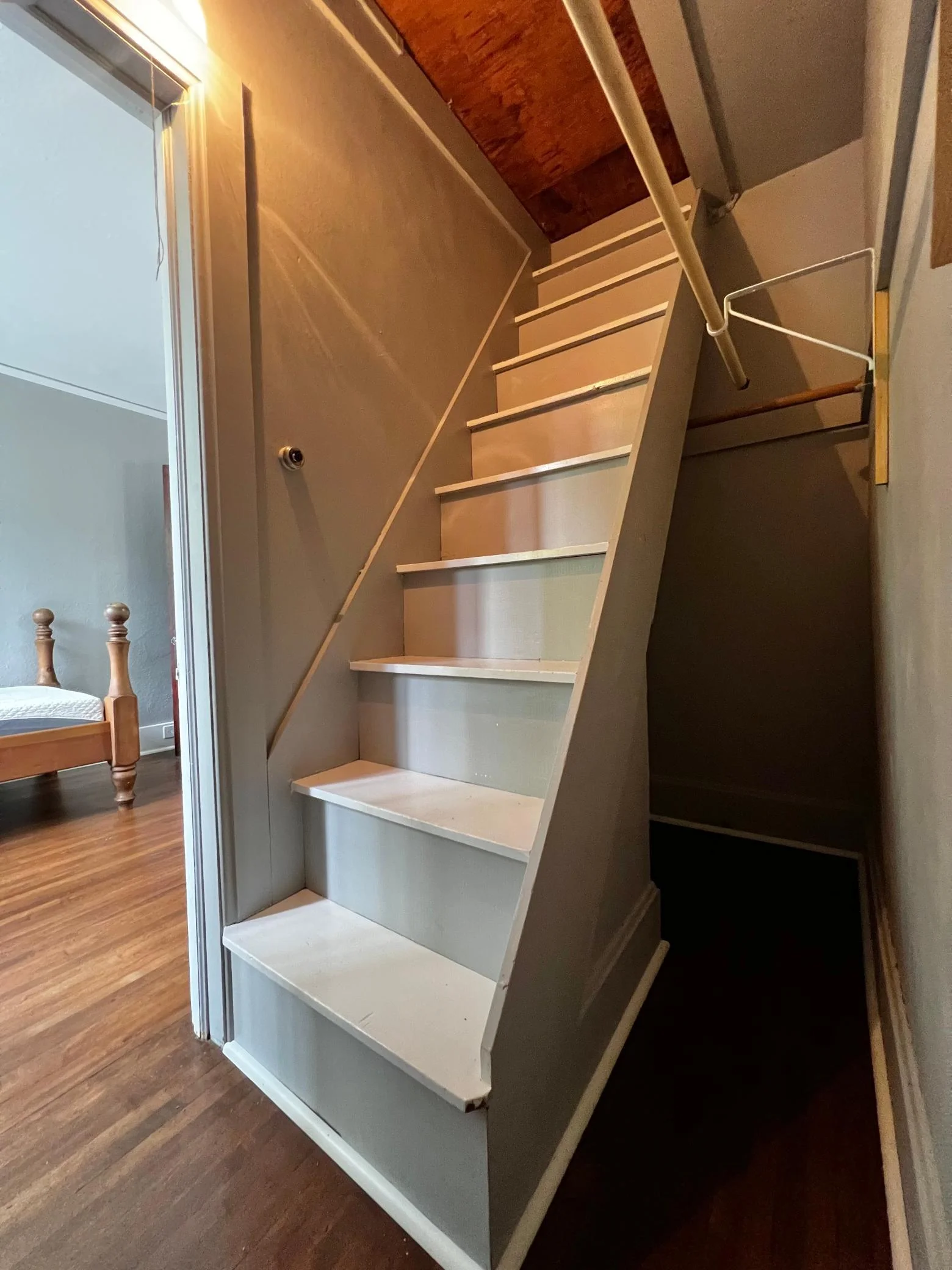 Second Bedroom Walk In Closet with Stairs to Attic.