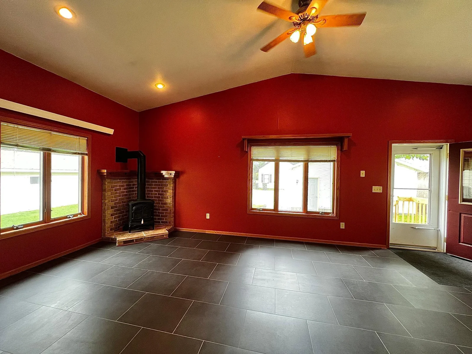 Family Room, with Wall Air Conditioner, Gas Fireplace and New LVP Flooring.