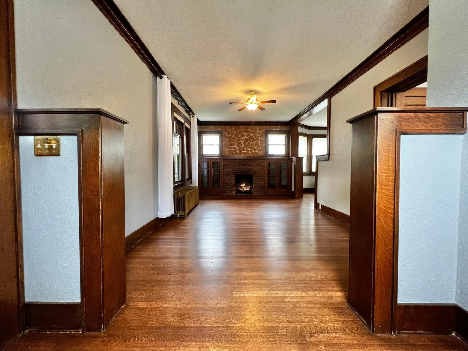 View of the Living Room with Built Ins and Fire Place - Imagine a Gas Fireplace?