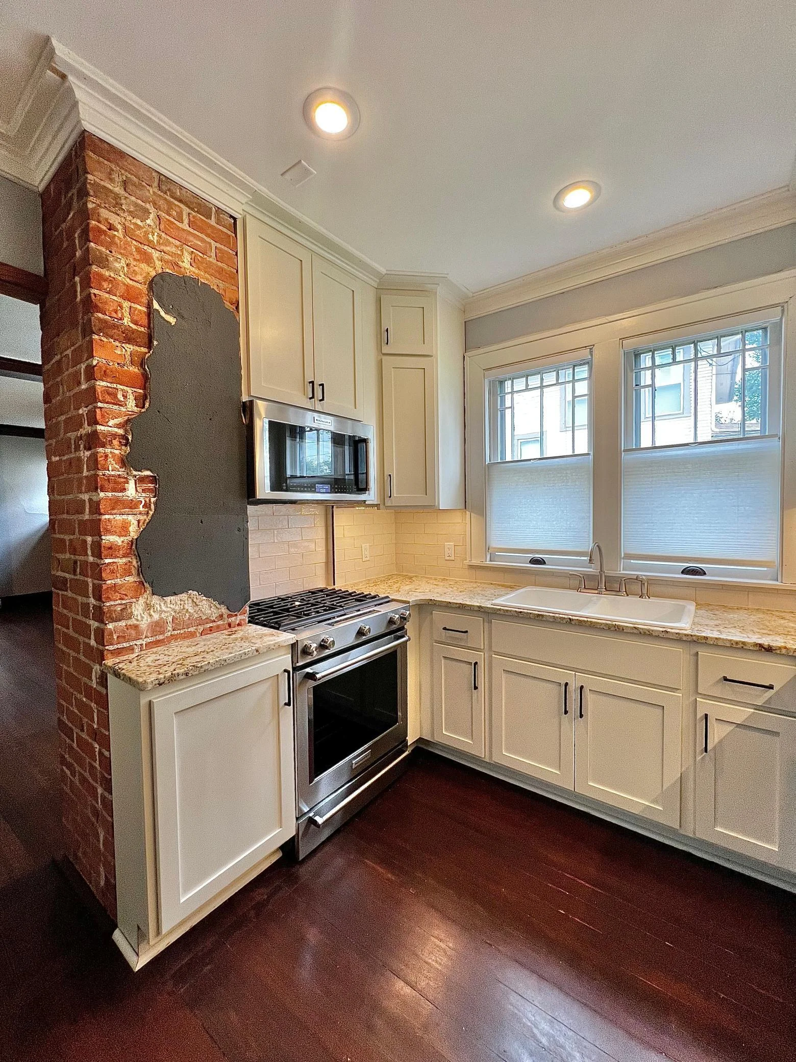 Custom Cabinets with Soft Close Feature, Kitchen Aid Pro Series Appliances, Ceramic Tile Backsplash, Granite Counter Tops.