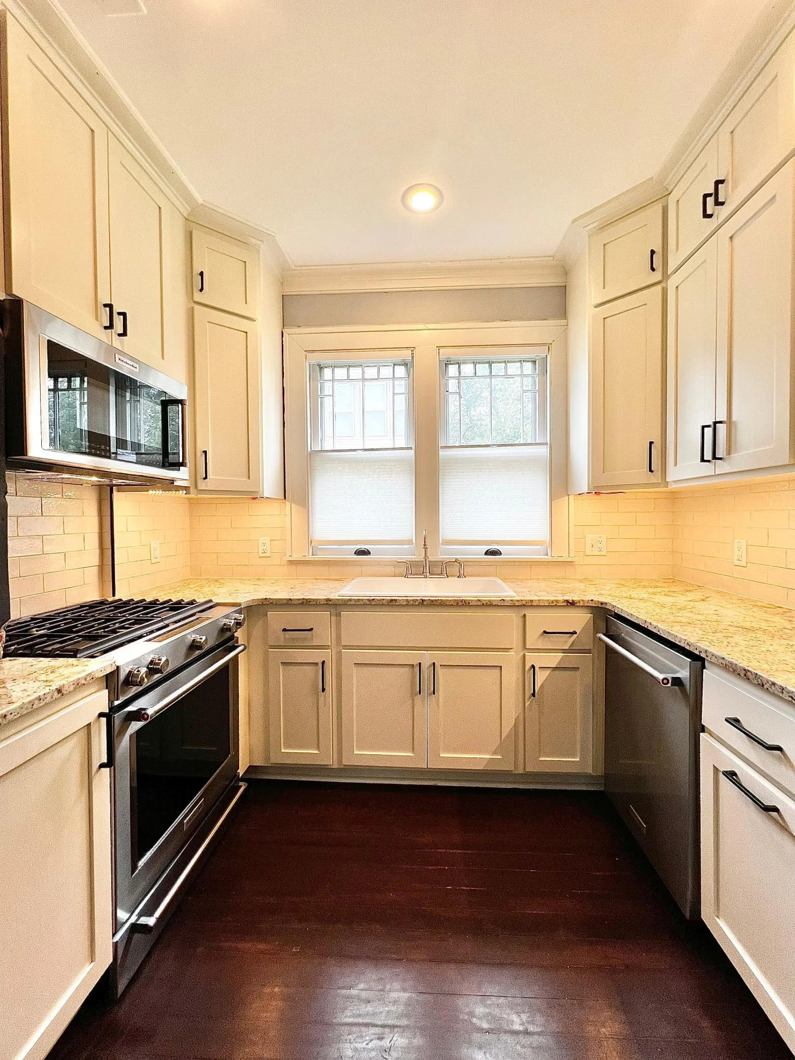 Custom Cabinets with Soft Close Feature, Kitchen Aid Pro Series Appliances, Ceramic Tile Backsplash, Granite Counter Tops.