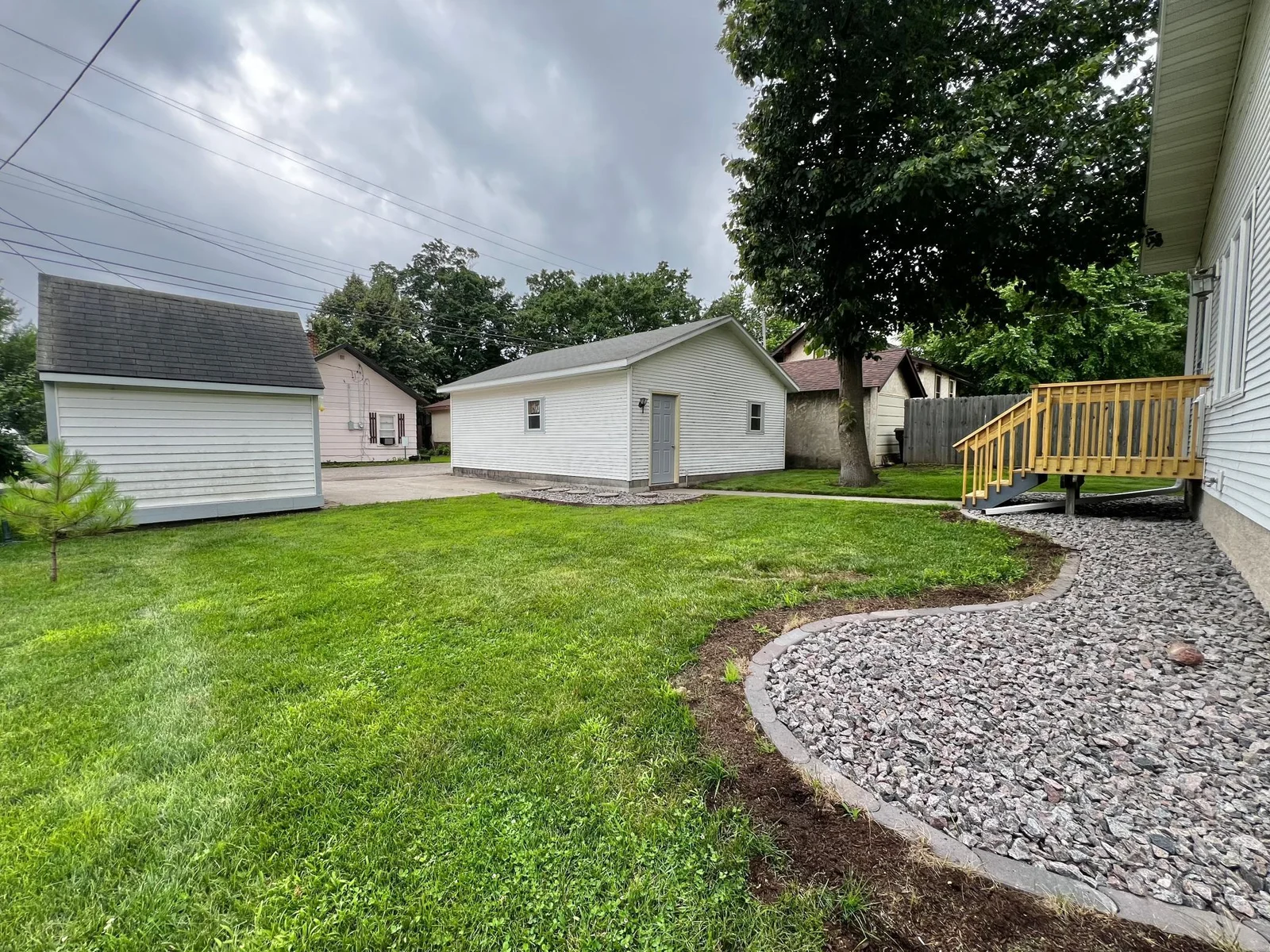Back Yard, Storage Shed and 2 Car Insulated Garage
