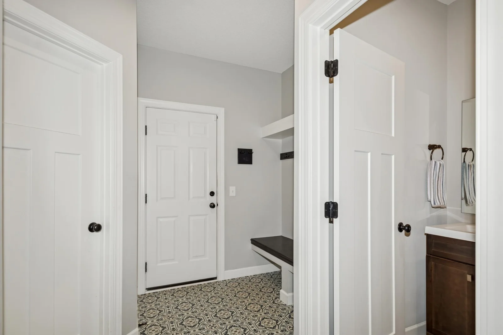 Entry from garage: closet & 1/2 bath