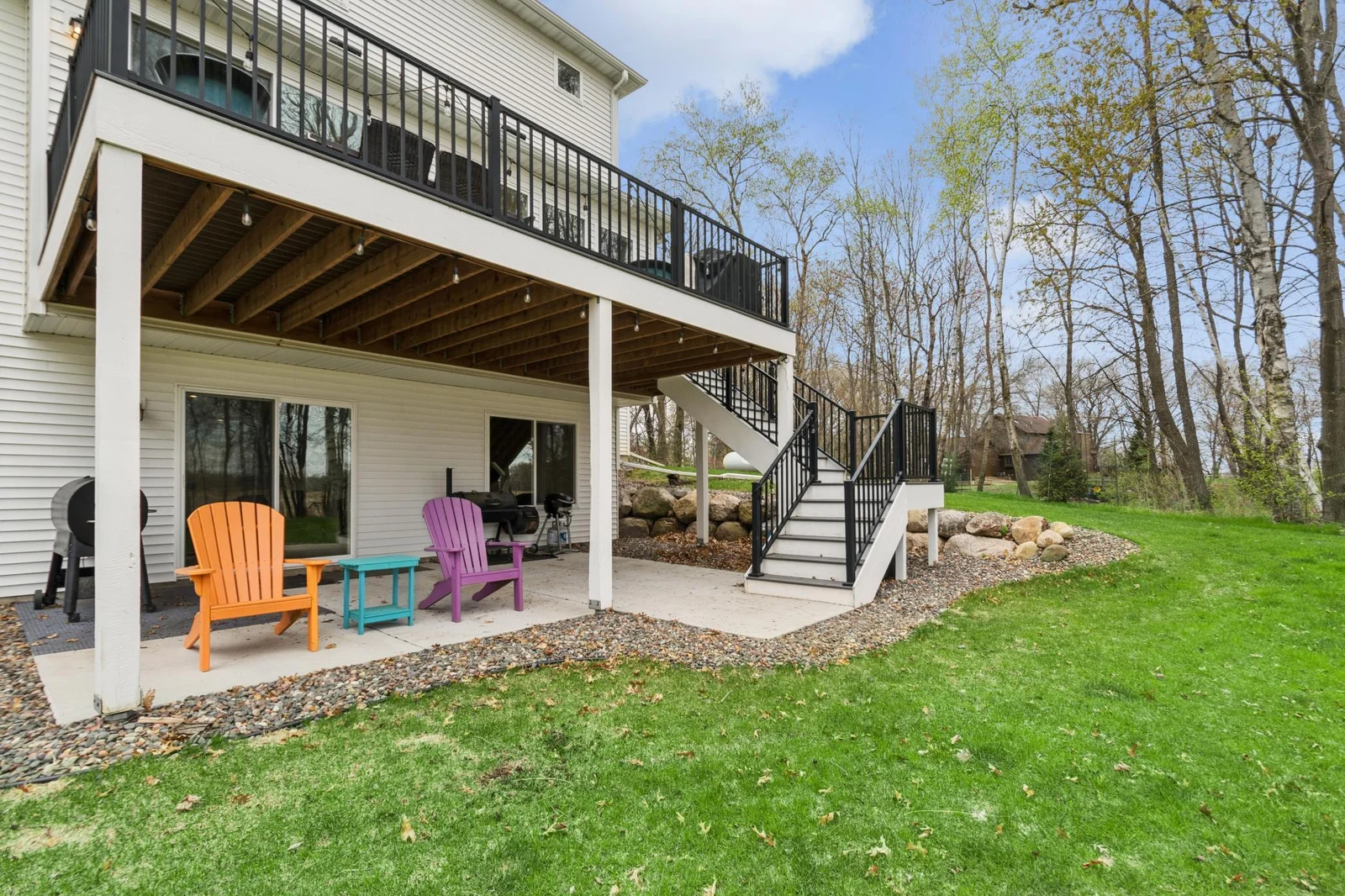 Patio off the LL family room & stairs to upper deck