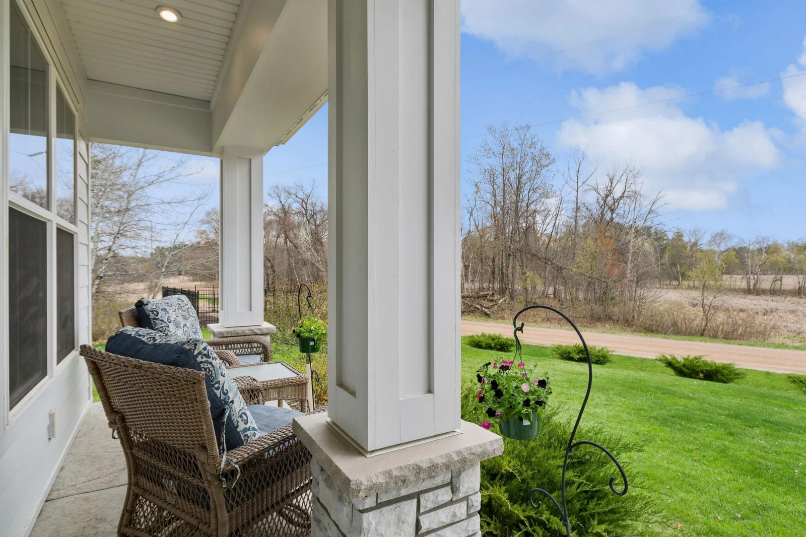 Front porch overlooks wetlands across the Ward Lake Drive