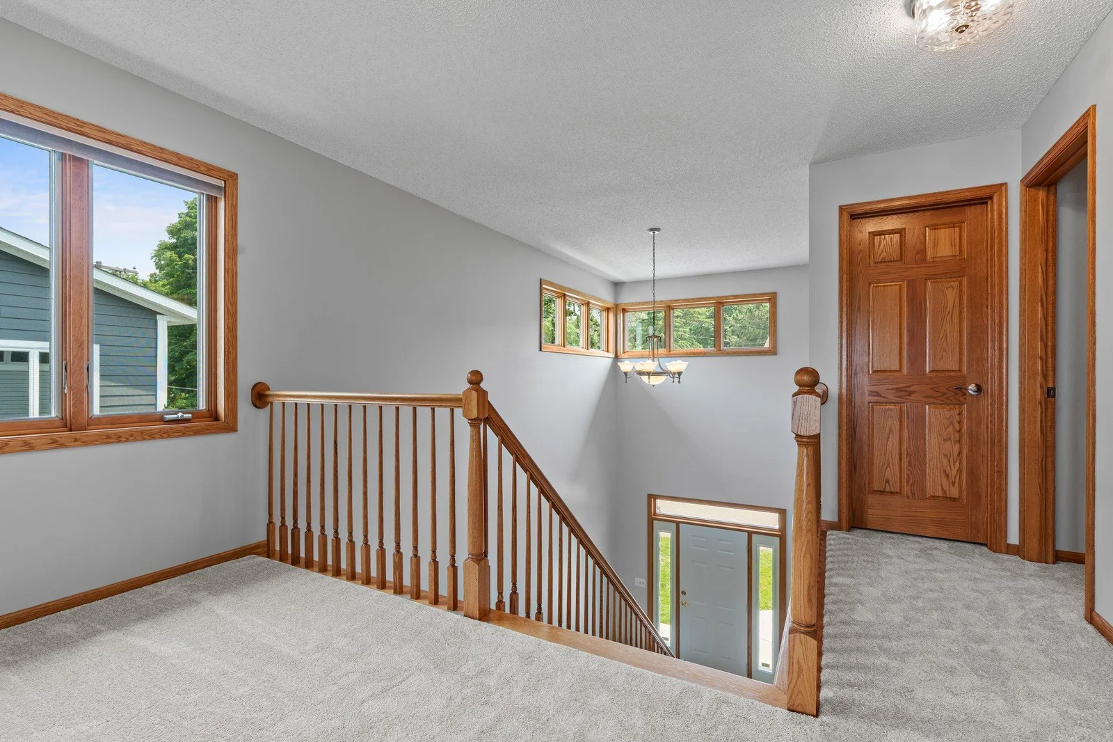 Vaulted staircase leads you upstairs