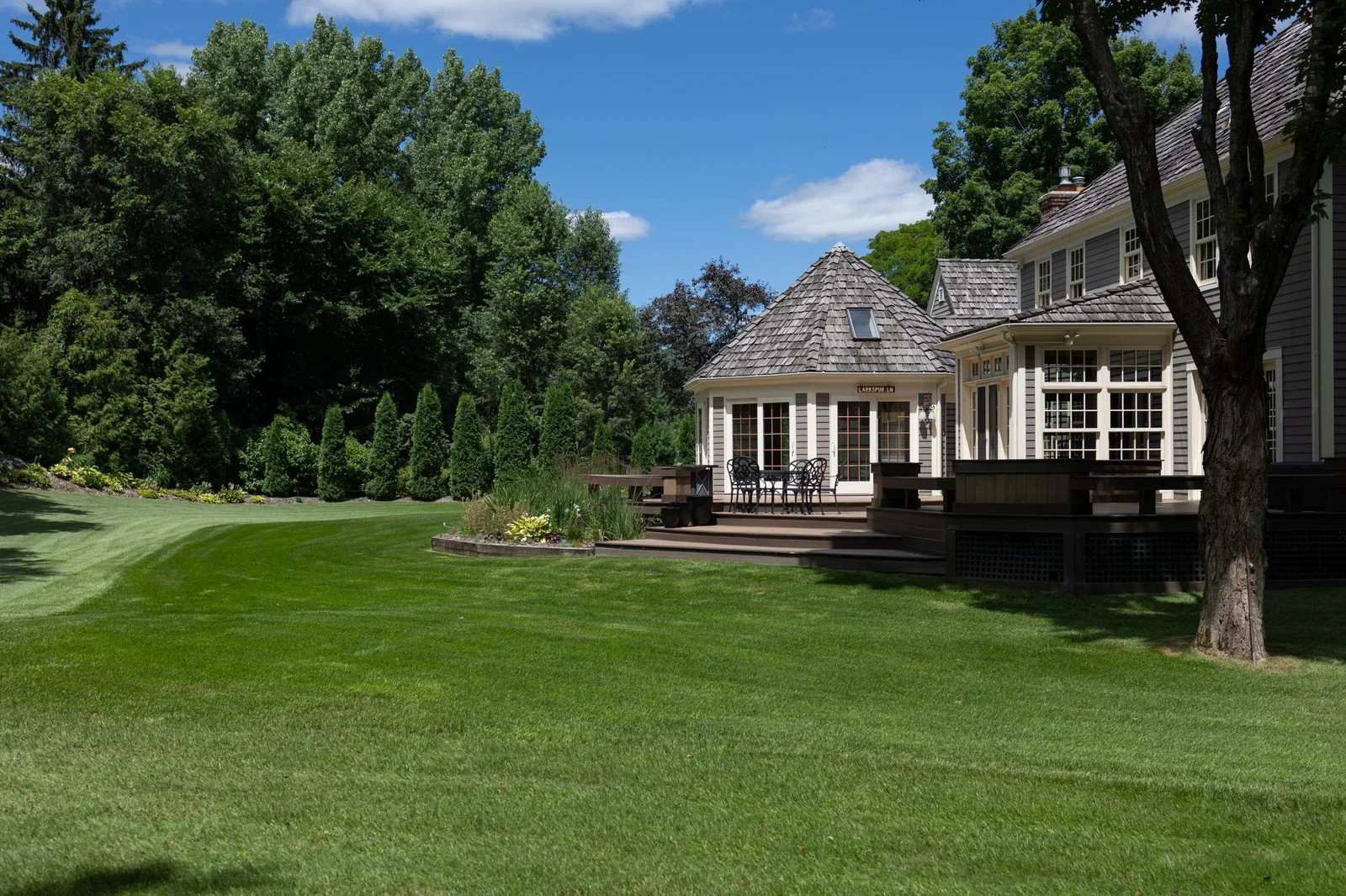 Enjoy Minnesota seasons from the large deck overlooking beautifully maintained gardens.