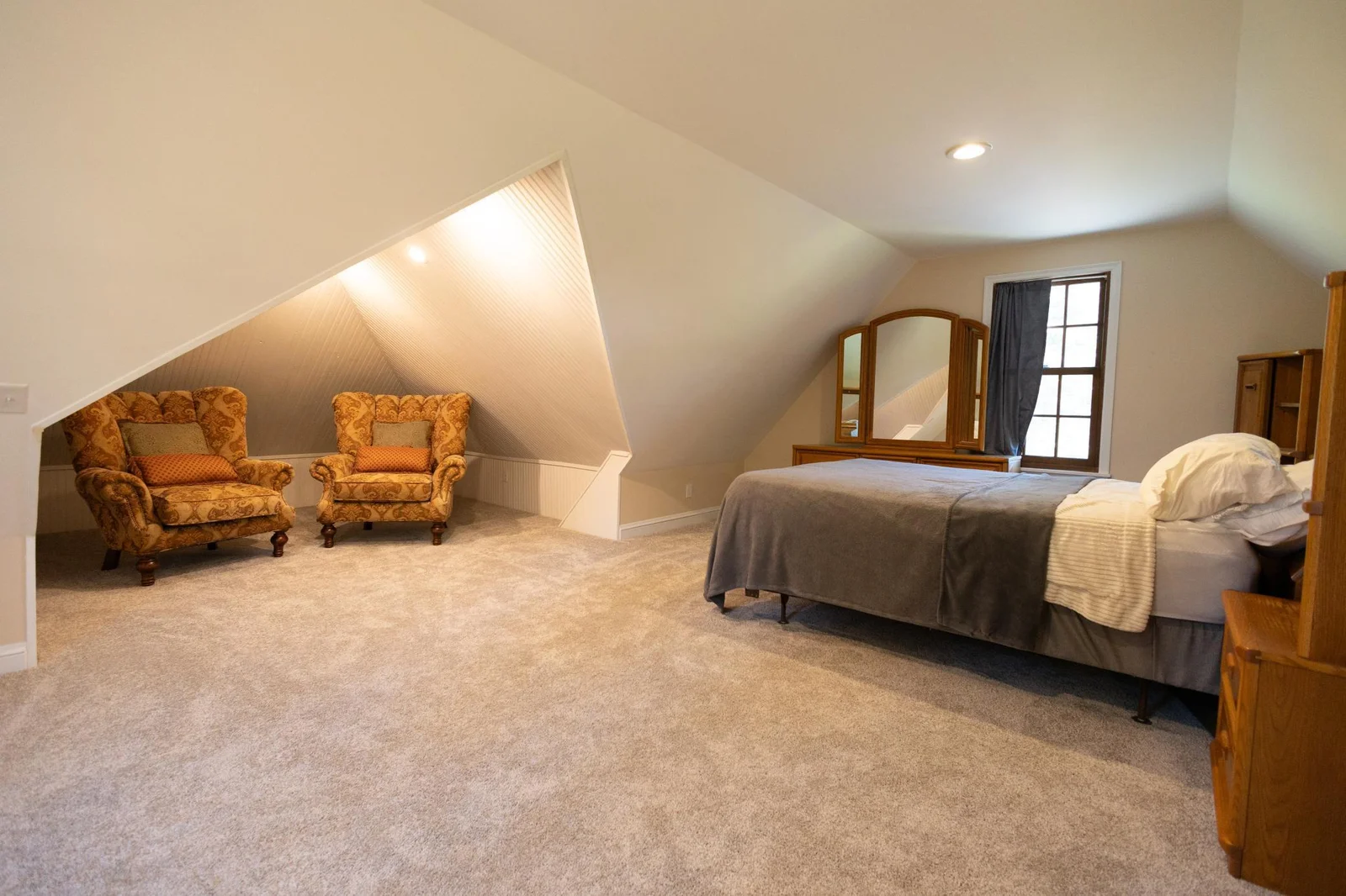 Bedroom 5 would be a great option for a guest bedroom or a mother-in-law bedroom. It is located off of the living room and has a walk-in closet.