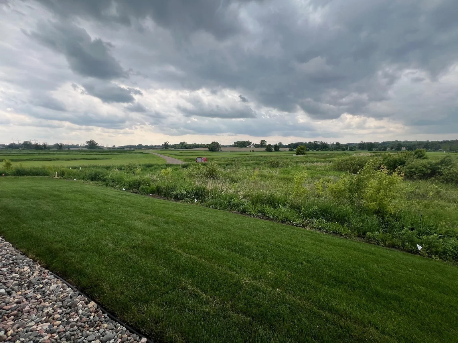 Photo is of the actual home. Gorgeous backyard views!