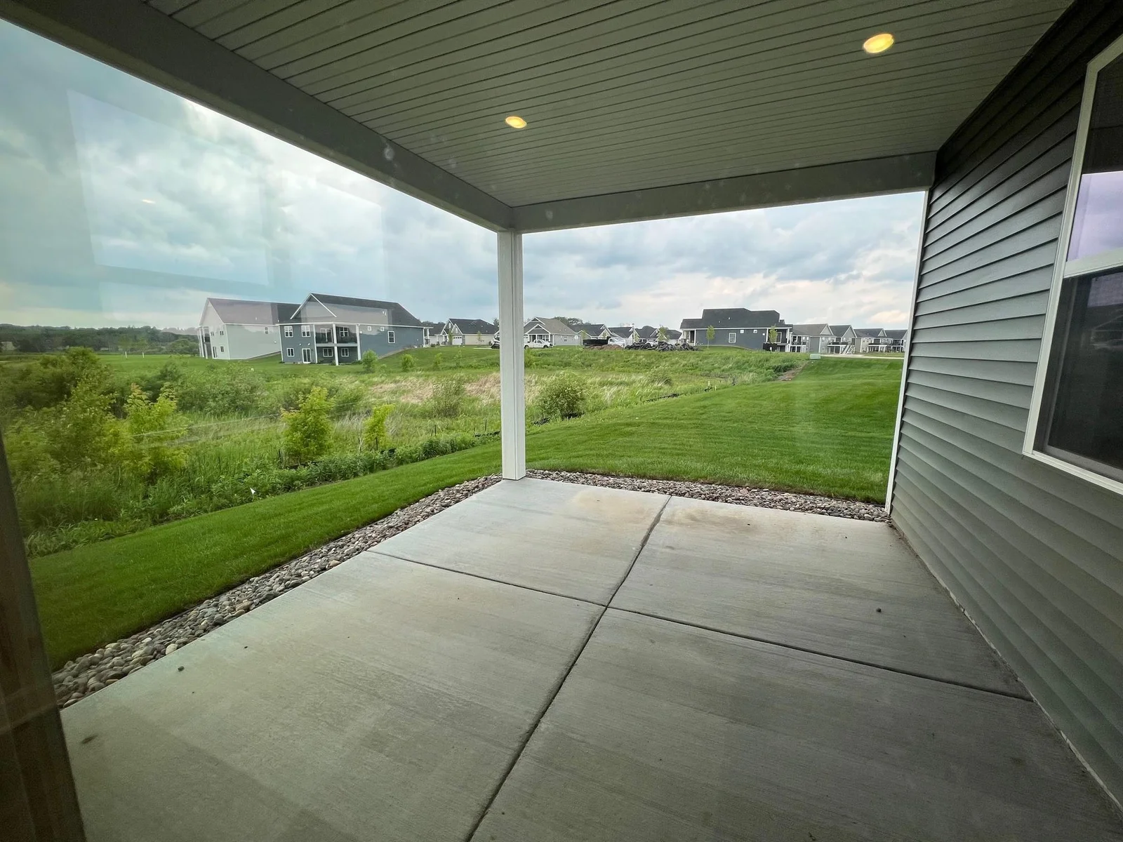 Photo is of the actual home. The back patio provides ample room for entertaining or relaxation!