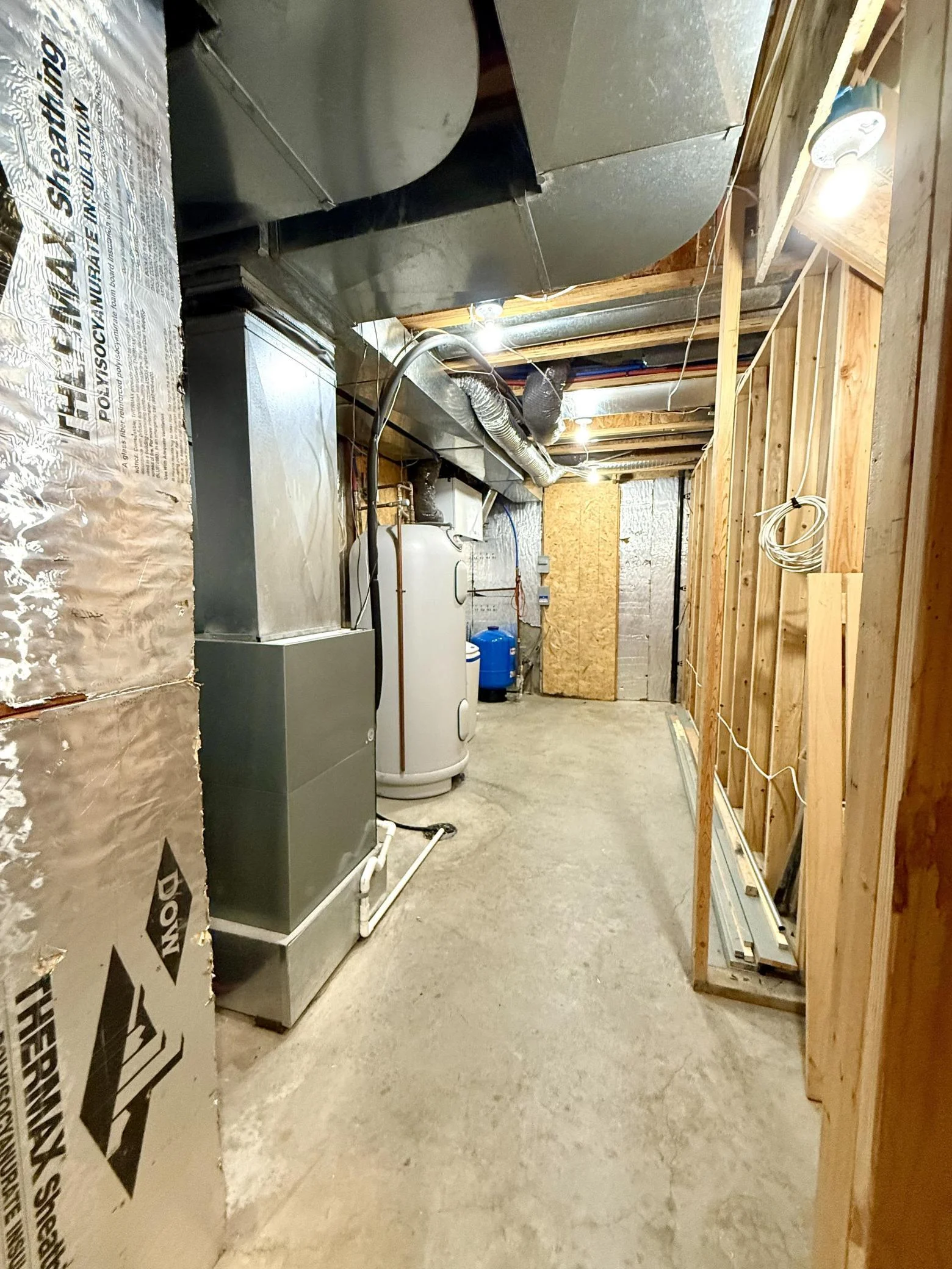 Lower Level Utility Room with an Abundance of Storage Space!