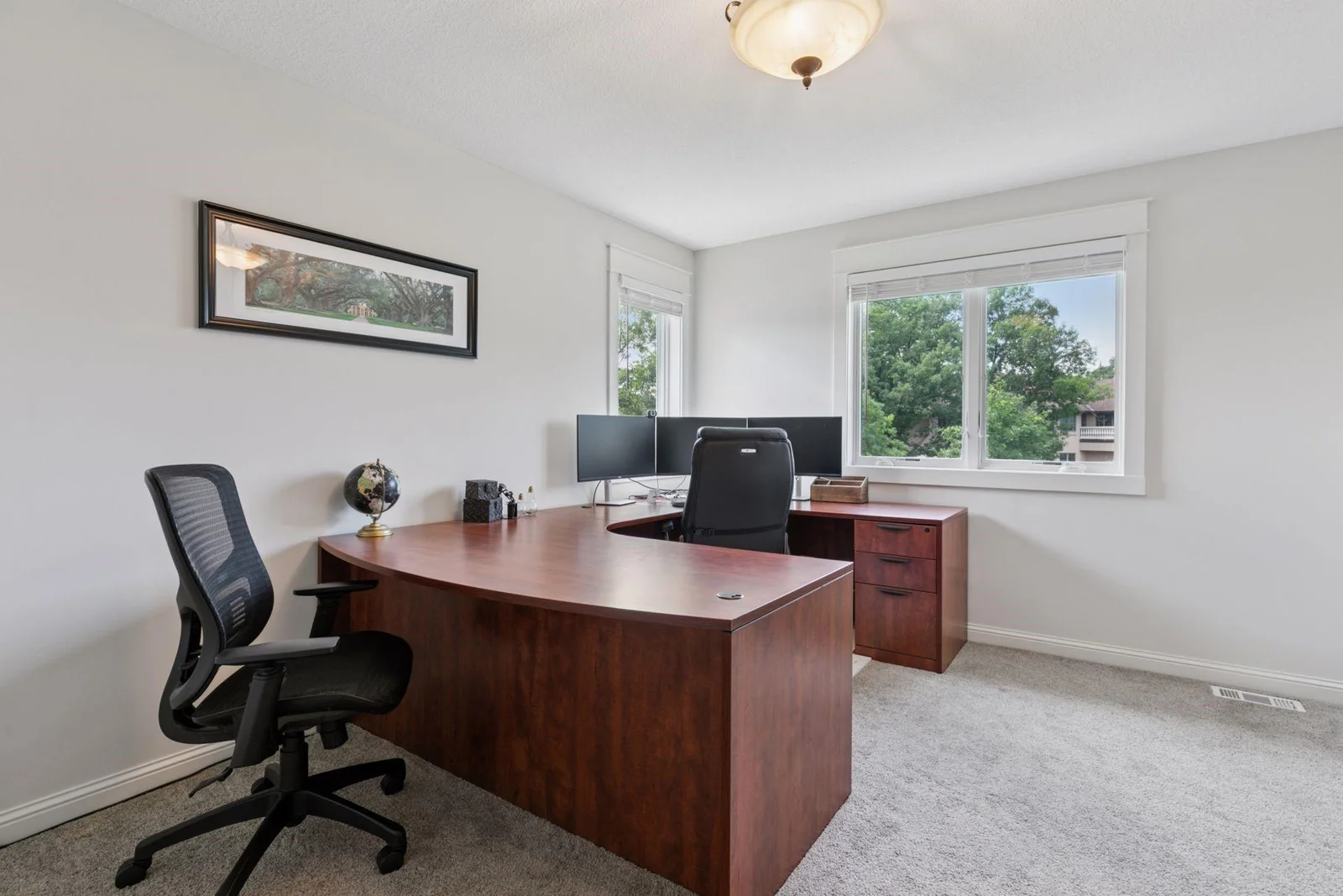 Junior Office Upper Level, a walk through from the Executive office making two generous sized office options on the upper level. There are 3 offices/flex spaces in this home.