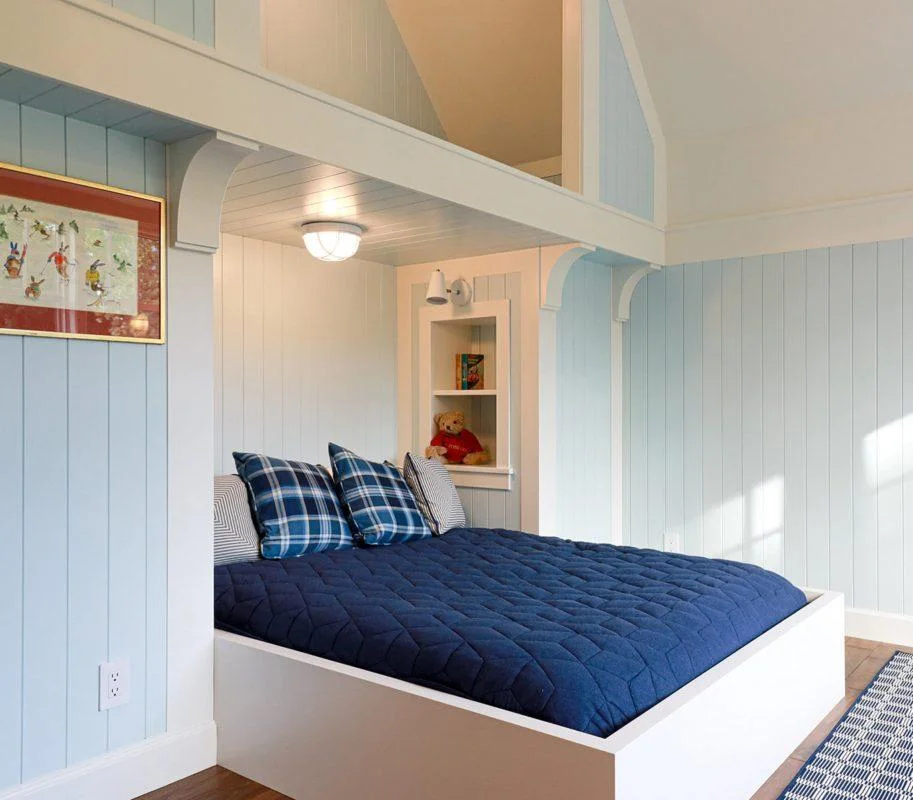 Custom bunkbeds add character and comfort to this thoughtfully designed retreat. Photo of a bedroom designed and built by BCD Homes