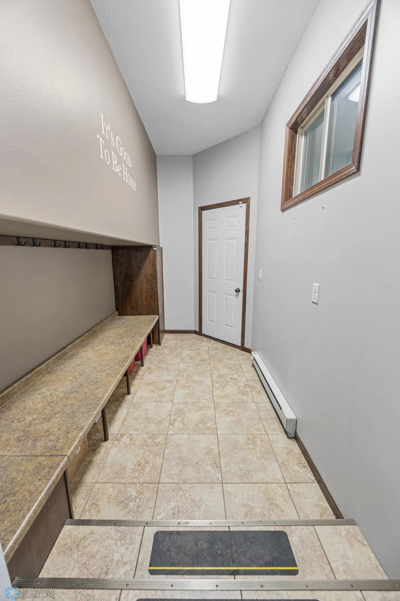 Mudroom located on main floor attached to garage